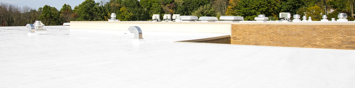 Roof Membranes (Cap Sheets) A white roof with cap sheet roofing applied by Garland.
