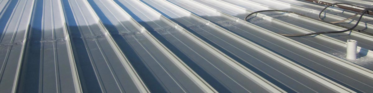 Roofing Primers A roof with a coat of white reflective roof coating from Garland.