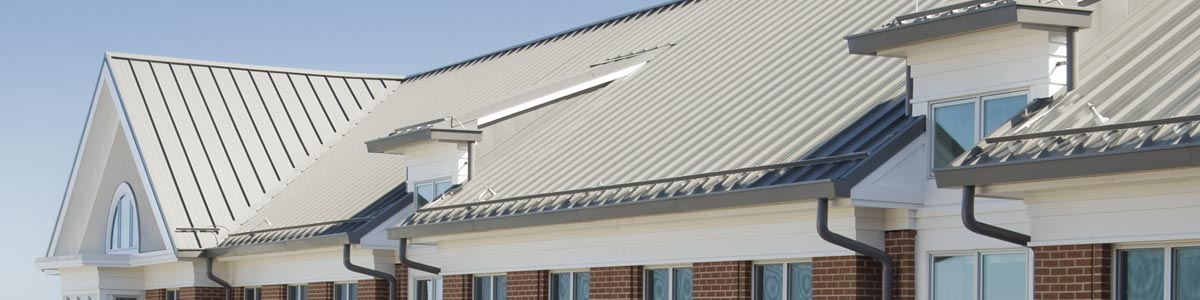 A gray metal roofing product by Garland on a commercial building.